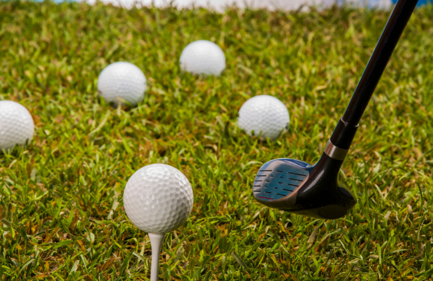 practicing golf