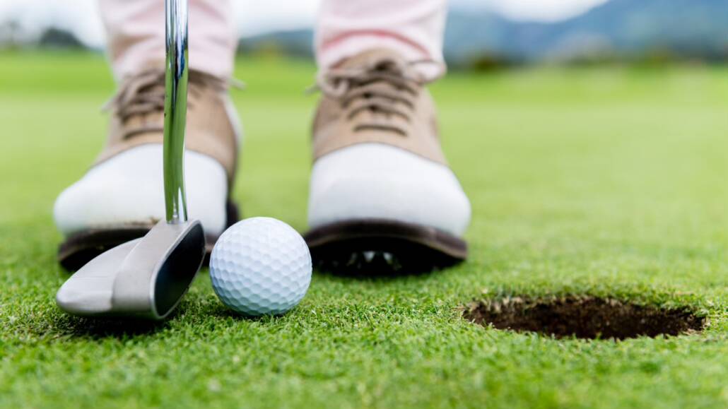 practicing golf